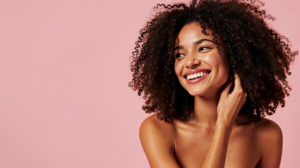 happy-woman-with-curly-hair-smiling-brightly_23-2151968652