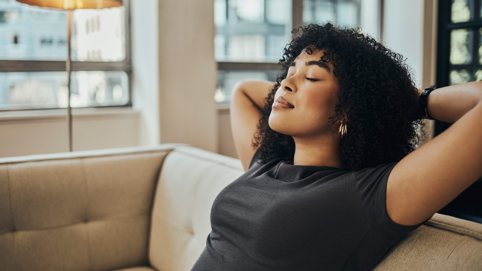 soft life aesthetic woman relaxing by window mental wellness feminine lifestyle